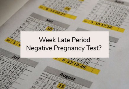 late period negative pregnancy test white discharge
